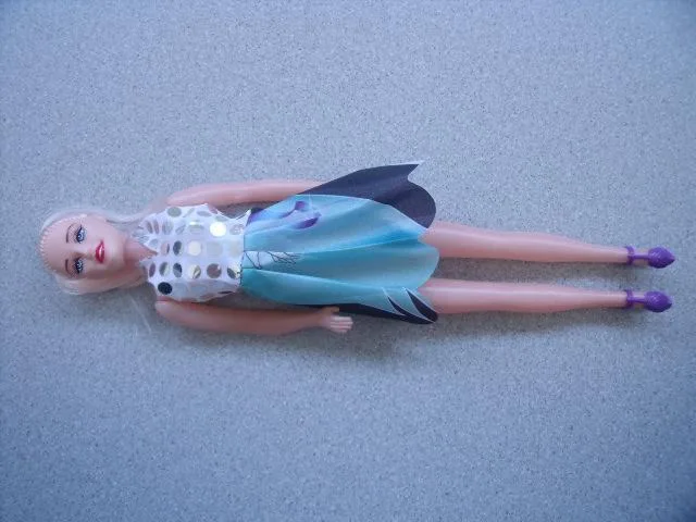 Plastic doll with accessories