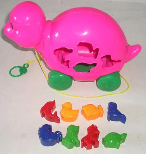 Plastic turtle on wheels