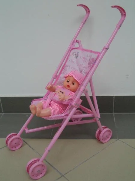 Toy pushchair with doll