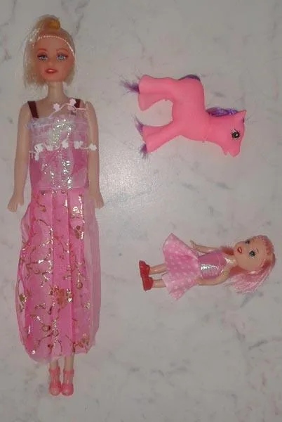 Plastic doll with accessories
