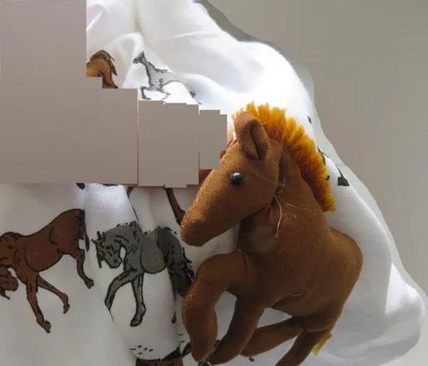 T-shirt with plush decorative features