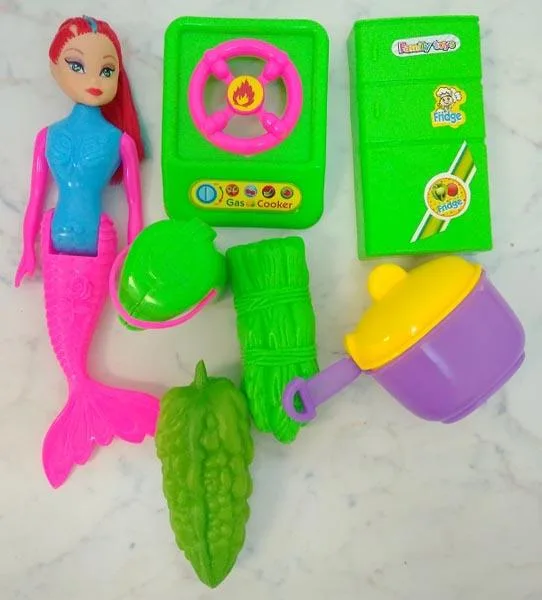 Plastic doll with accessories