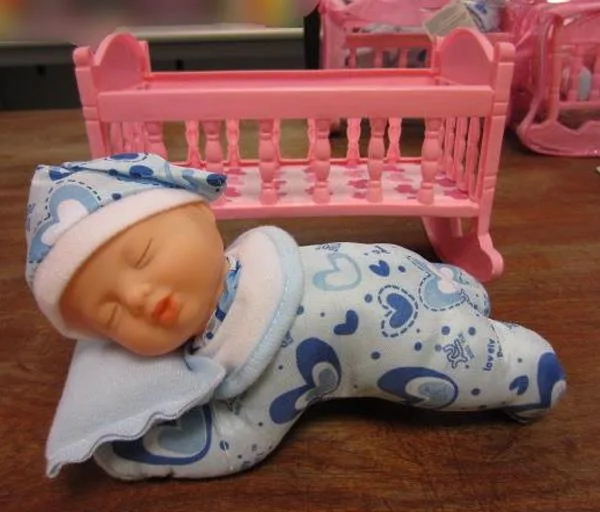 Plastic doll with accessories