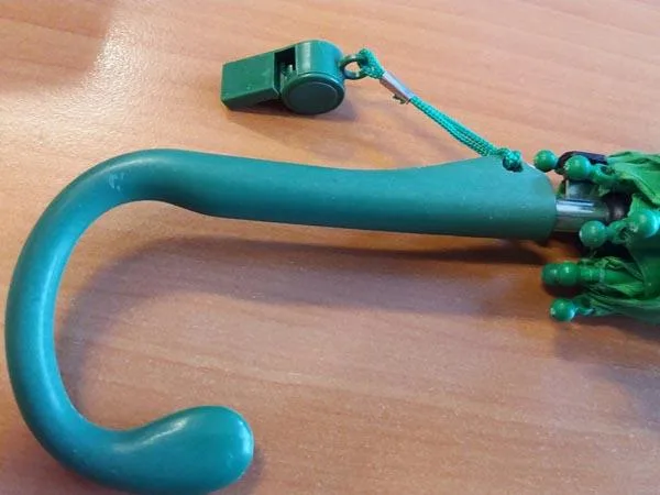 Umbrella with whistle