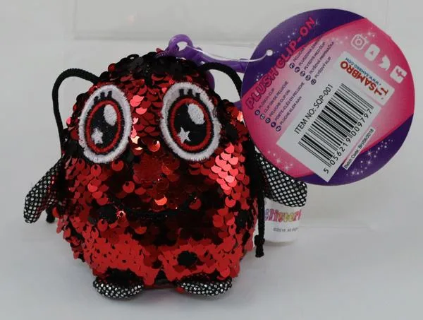 Soft toy with sequins