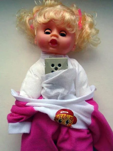 Toy pushchair with doll