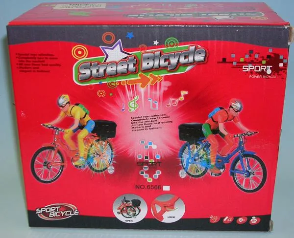 Plastic doll on a bicycle