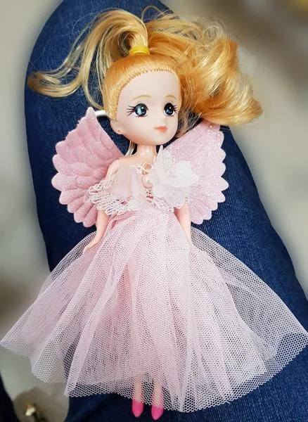Hanging plastic doll