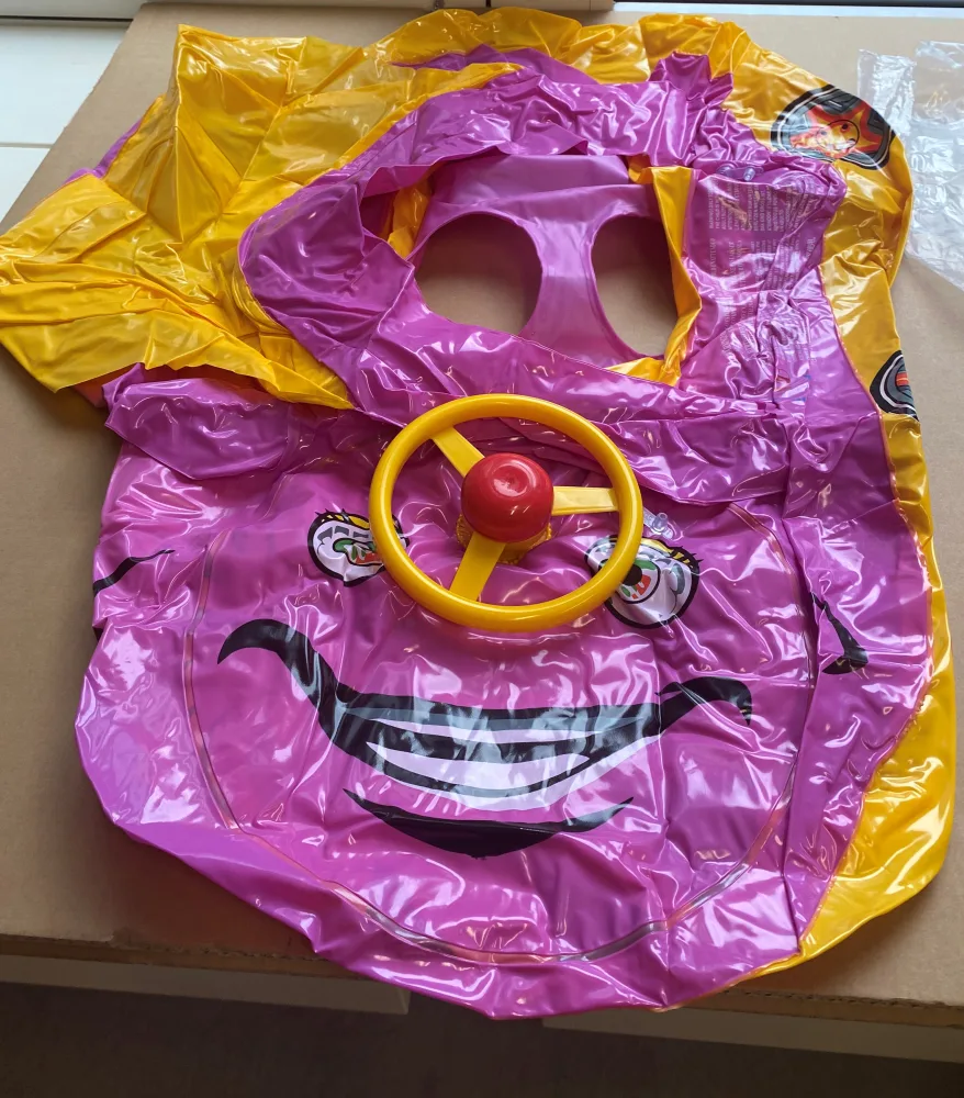 Inflatable floating seat