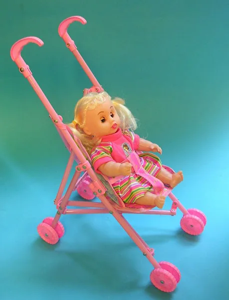 Toy stroller with doll