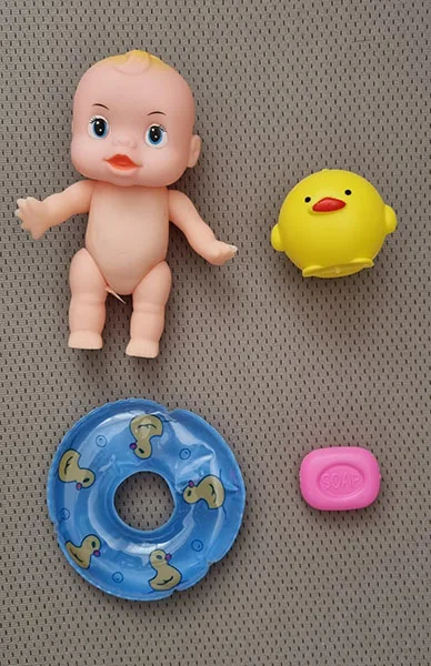 Plastic doll with accessories