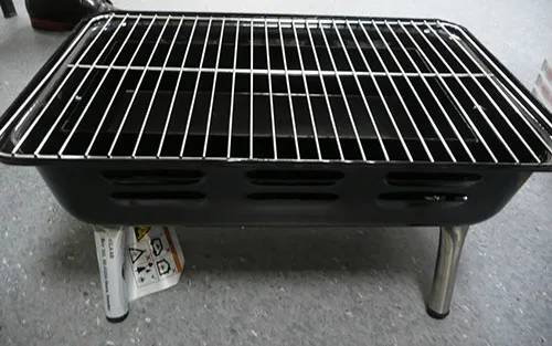Portable charcoal grill