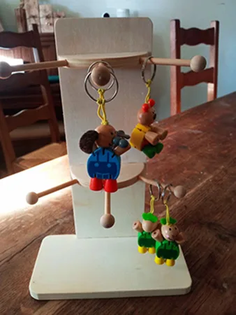 Wooden toy with key ring