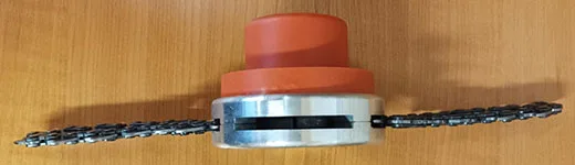 Flail-type cutting attachments for brush cutters