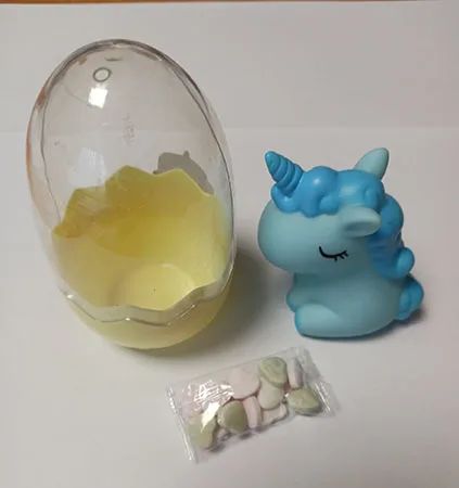 Toy unicorn in a plastic egg