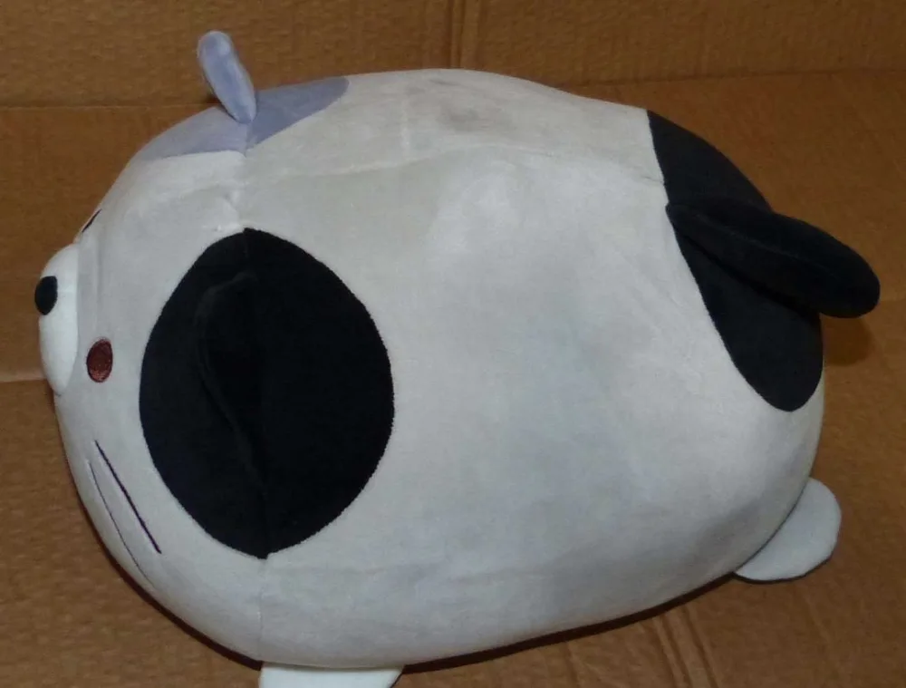 Peluche chat aux oreilles jaune et noire