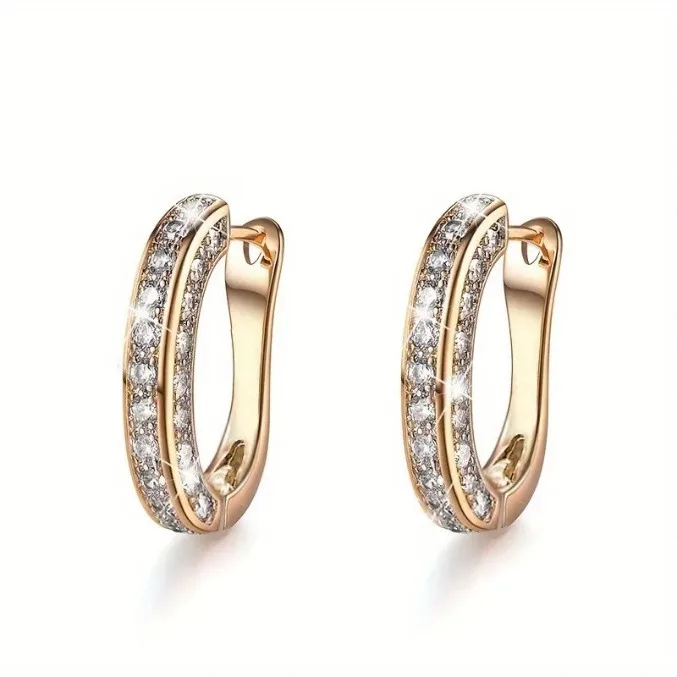 Boucles d'oreilles créoles décorées de strass brillants