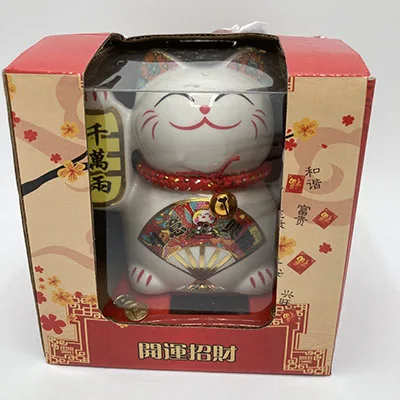 Waving cat