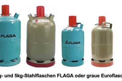 5-kg- und 11-kg-Stahlflaschen der Marke FLAGA sowie graue Kaufflaschen